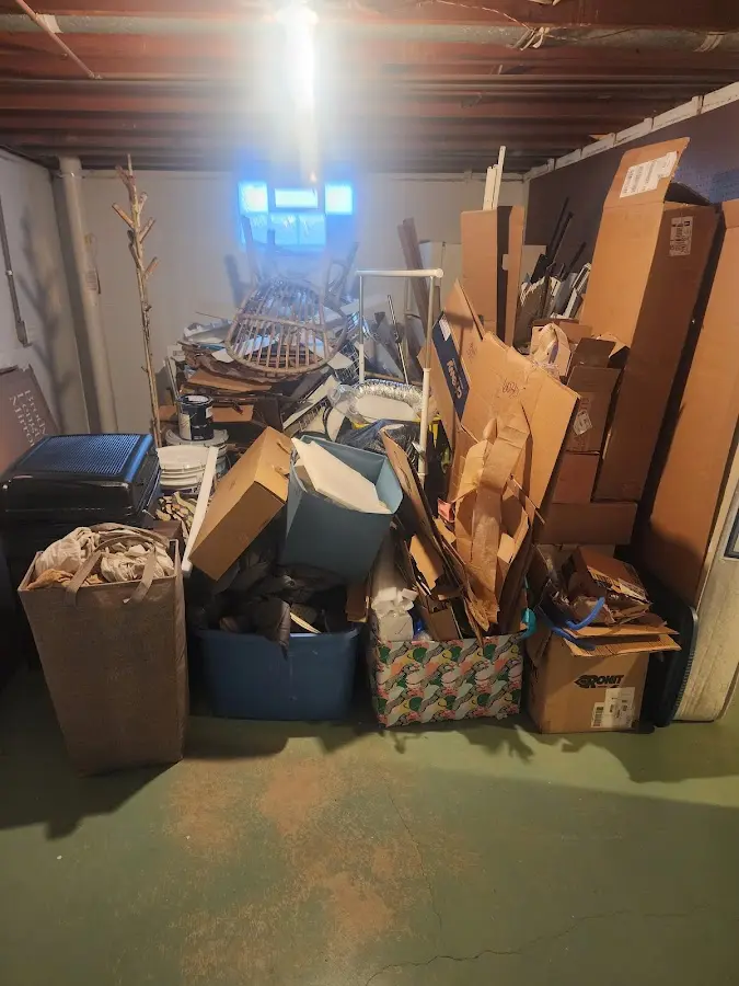 Roll-off dumpster container at job site for 15 Yard Dumpster Rental in Odenville